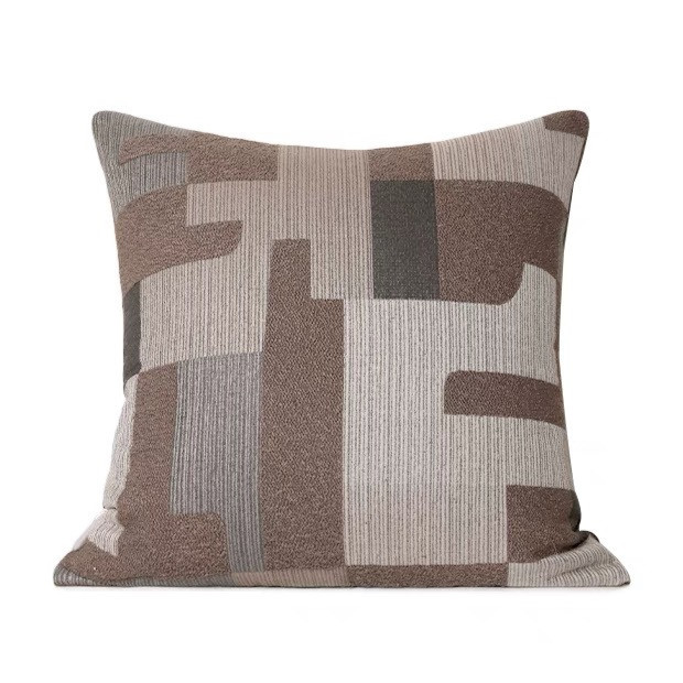A modern abstract design brown pillow