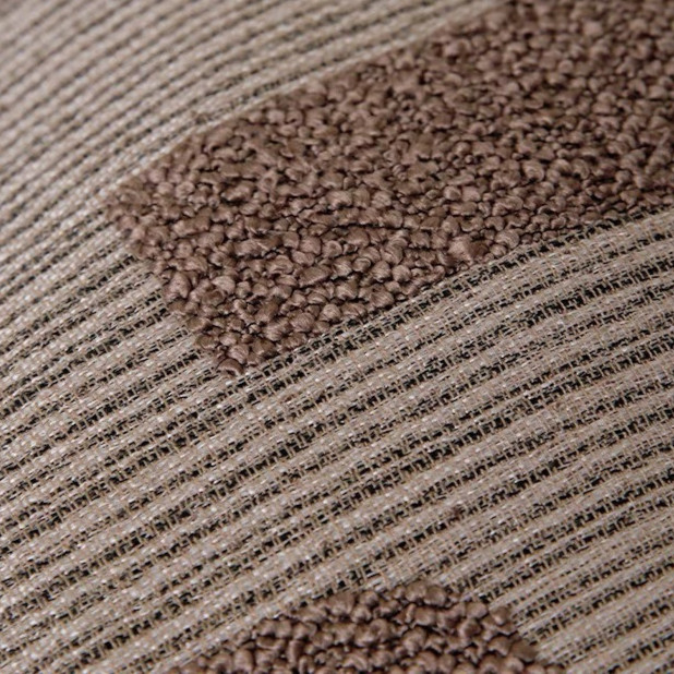 A modern abstract design brown pillow