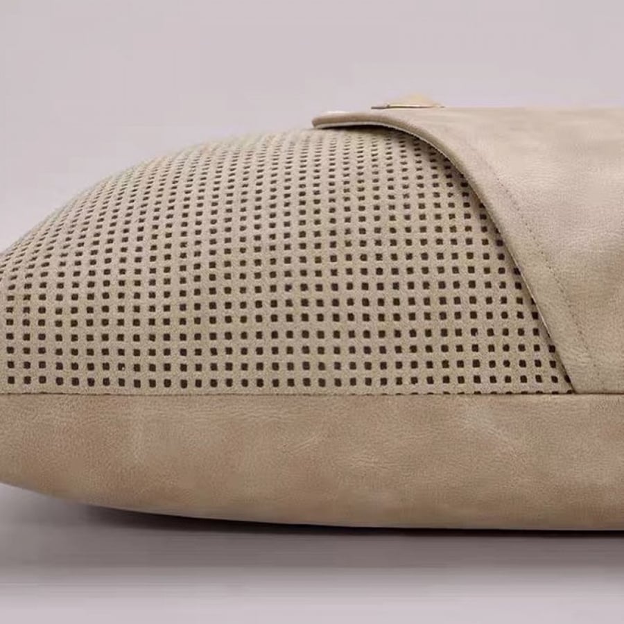 Leather cover cushion and dotted fabric in warm beige earthy color