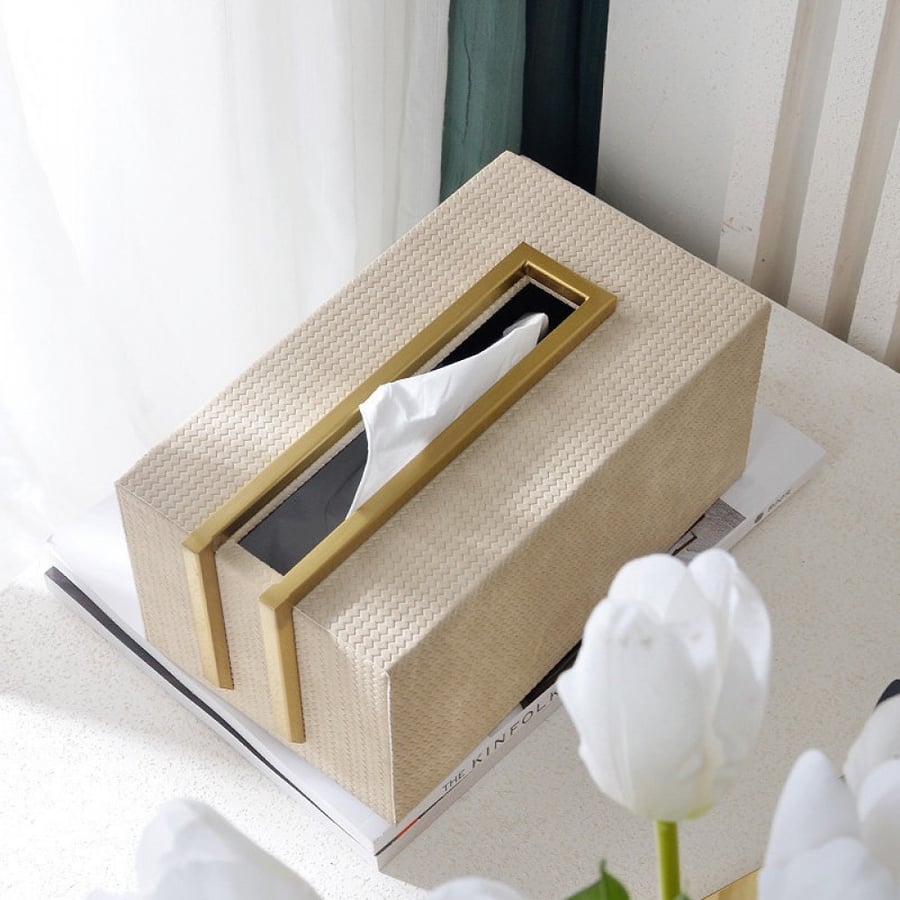 A beige-colored tissue box