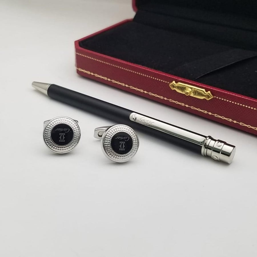 Pen and Cartier cufflink