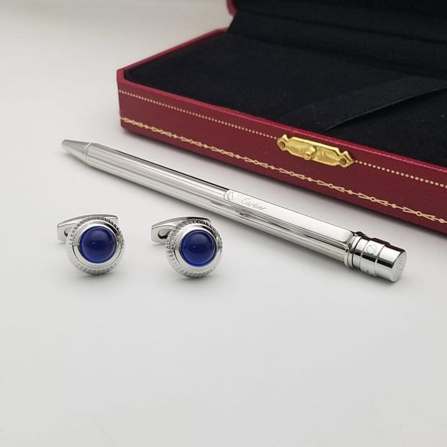 Pen and Cartier cufflink