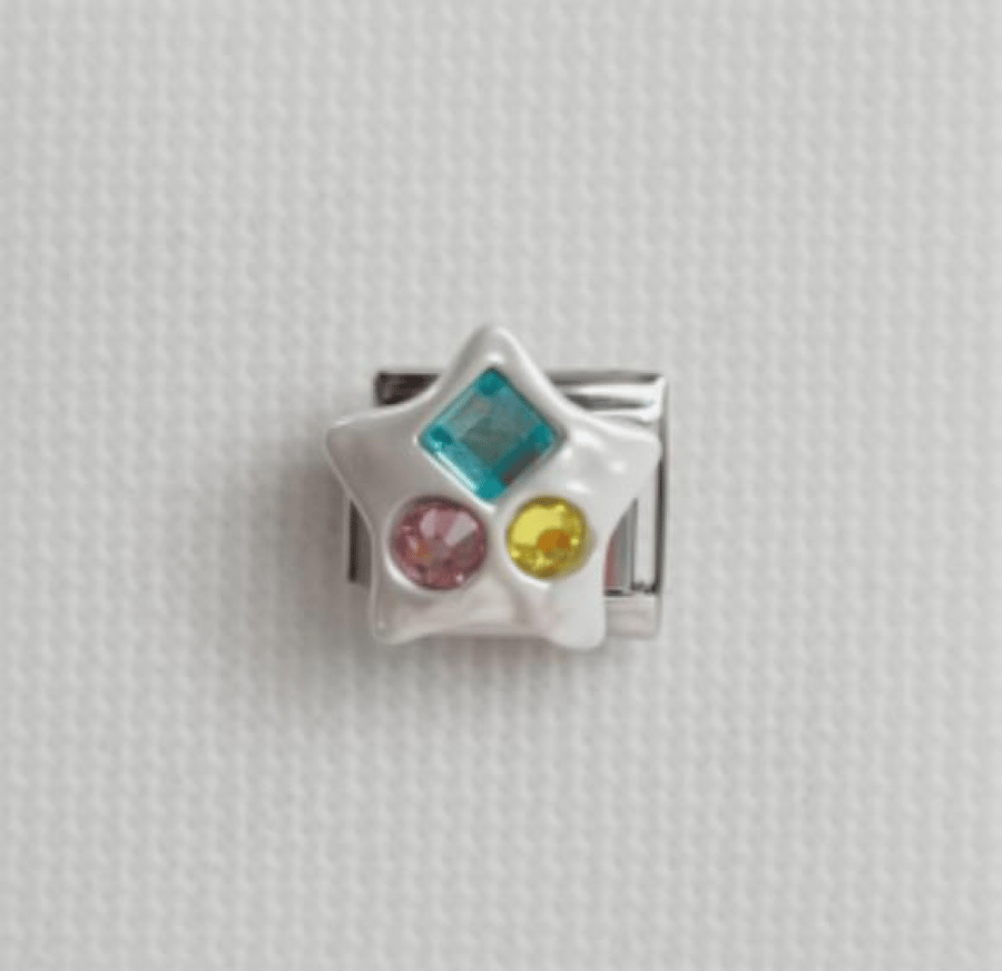 Charm silver with white stone decorated with colorful crystals