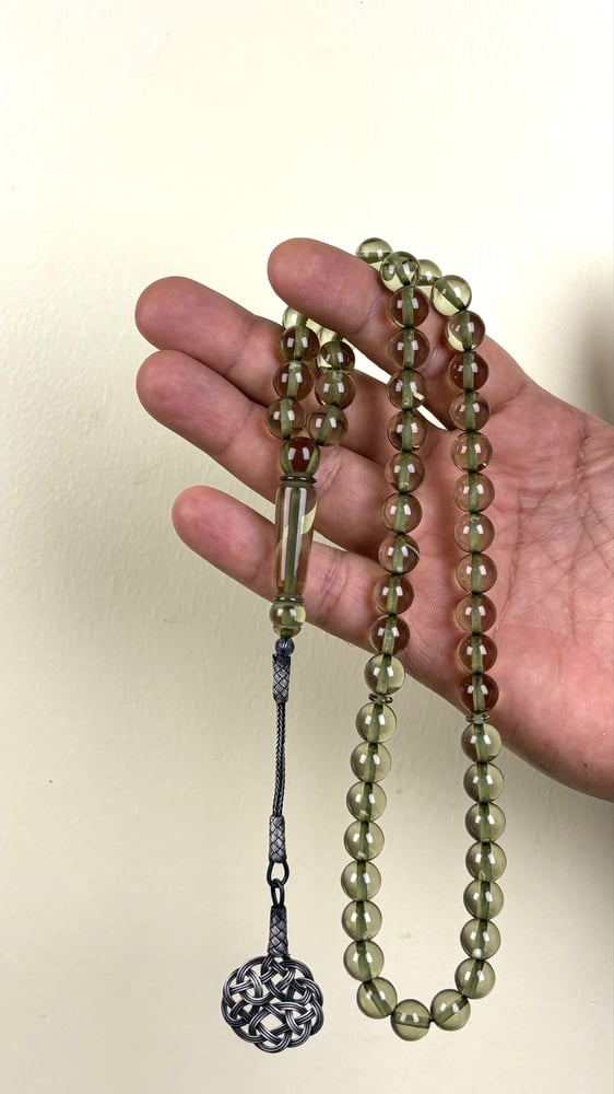 مسباح بكلايت بلجيكي زيتي شفاف - طربزونة فضة عيار 1000