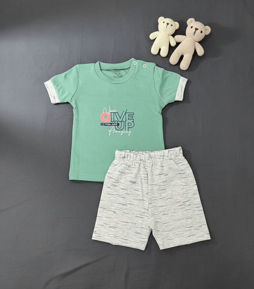 T-Shirt and Shorts. With a "Never Give-Up" Theme  -  تيشيرت وشورت. بتصميم "لا تستسلم أبدًا".