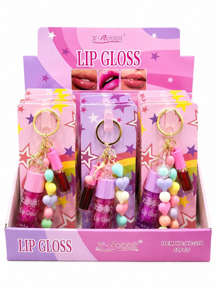 A dozen 12 pieces of my daughters' lip gloss with a pendant medal
