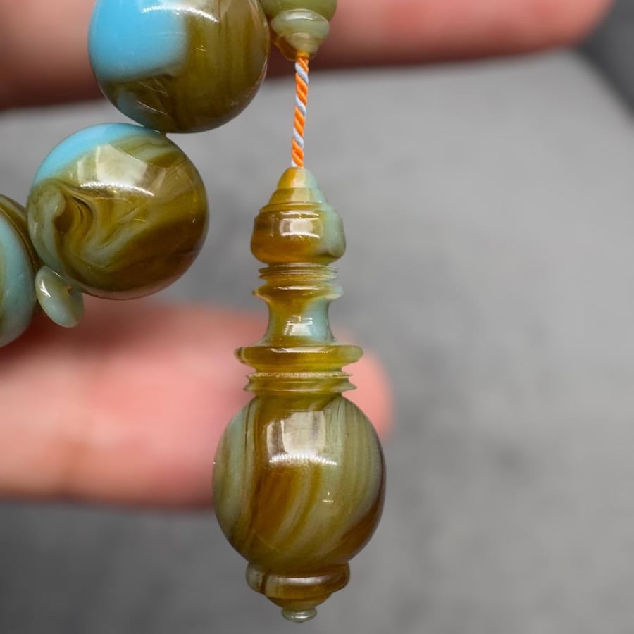 Blue turquoise stick with marbled engraving by Al-Barai