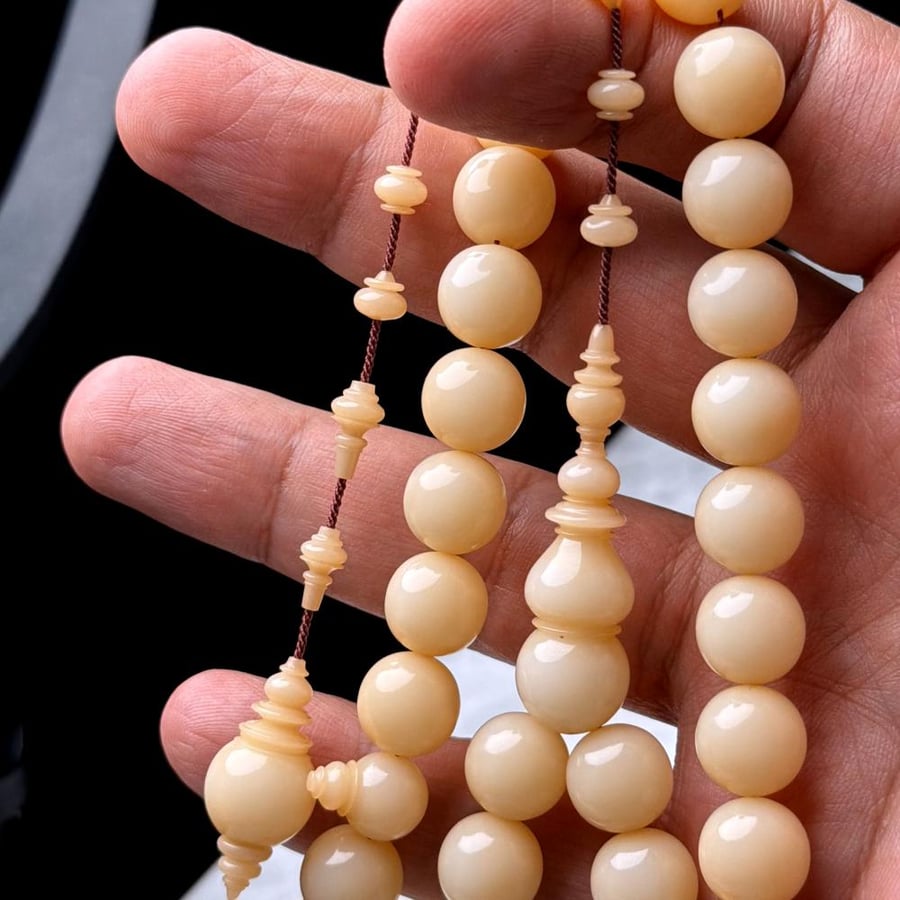 Dumana pearl prayer bead, pirate's disc engraving
