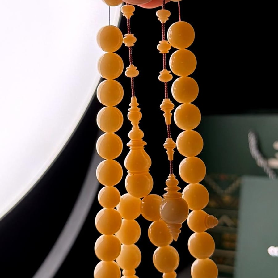 Dumana pearl prayer bead, pirate's disc engraving