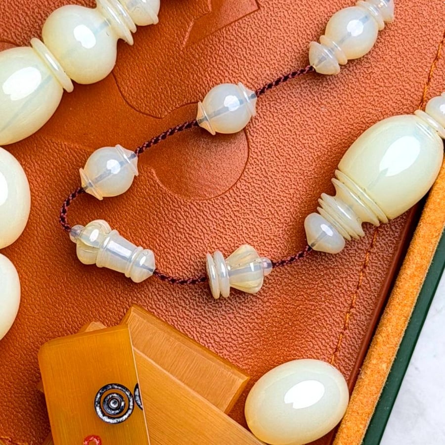 Domeena transparent pearl rosary