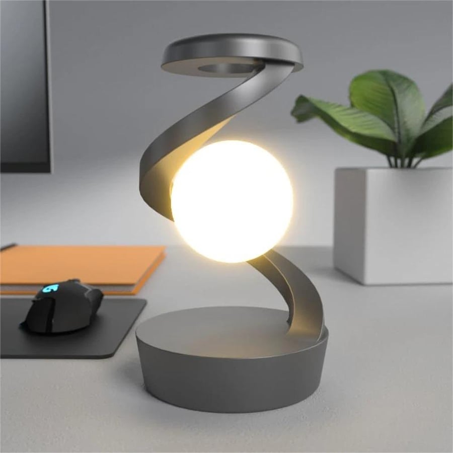 Floating LED lamp in the shape of a globe with wireless charger