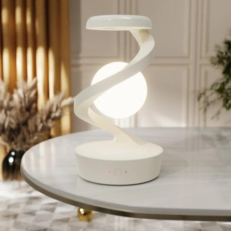 Floating LED lamp in the shape of a globe with wireless charger