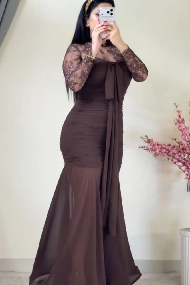 Elegant and attractive evening dress decorated with lace