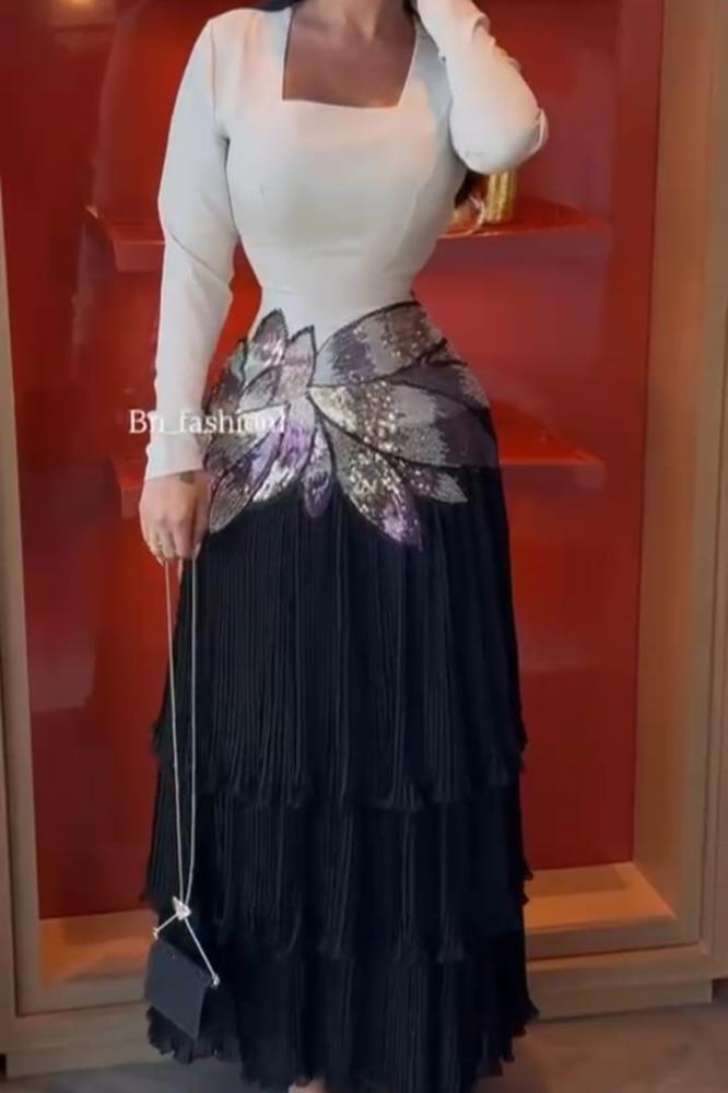 فستان سهرة أنيق بكلفة وكسرات بيليسيه