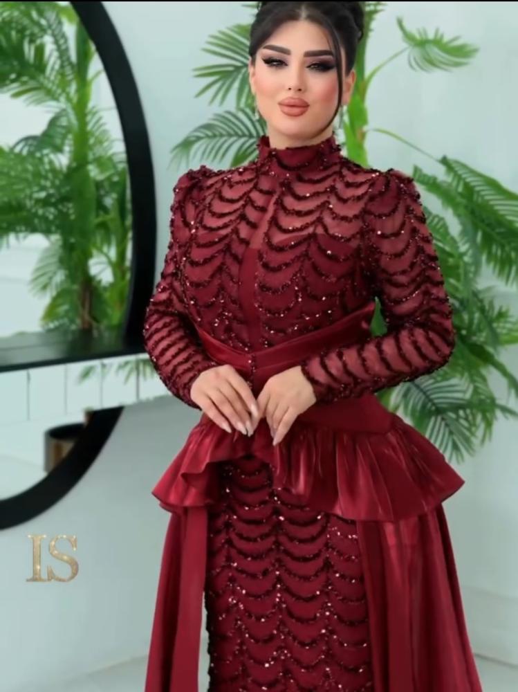 فستان سهرة شك بذيل كرنكل وبطانه باربي