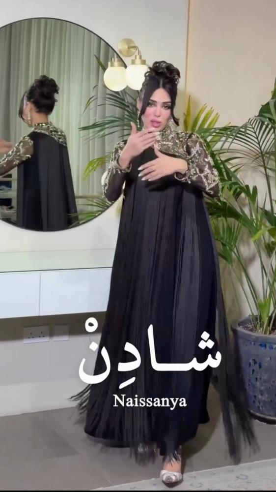 فستان حمل اسود هدب بتطريز يدوي