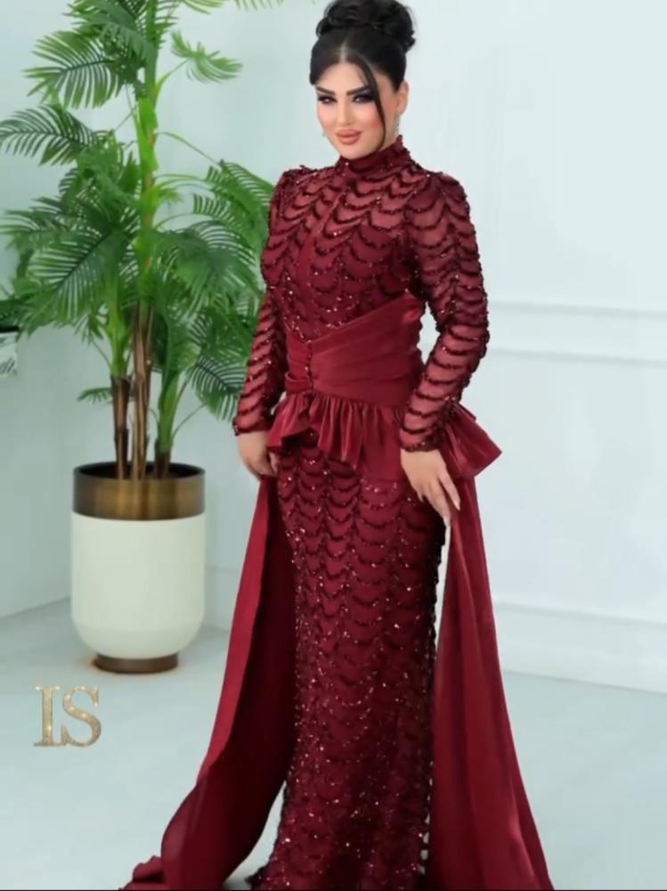 فستان سهرة شك بذيل كرنكل وبطانه باربي