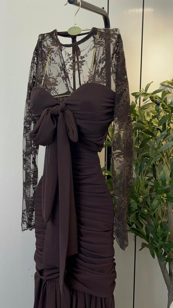 Elegant and attractive evening dress decorated with lace