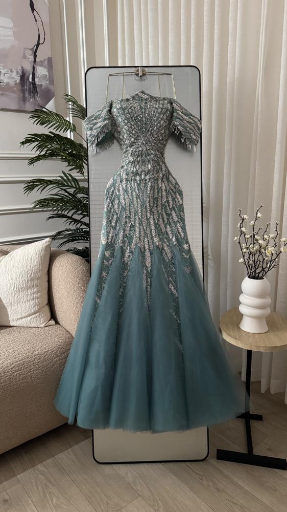 فستان سهرة كلفه شك على تداخيل كلوش تل