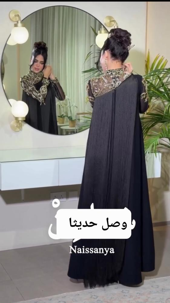 فستان حمل اسود هدب بتطريز يدوي