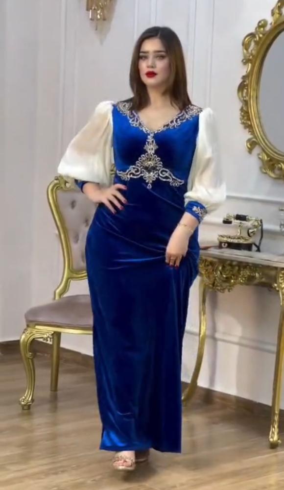 فستان سهرة ازرق مخمل بتطريز يدوي أنيق
