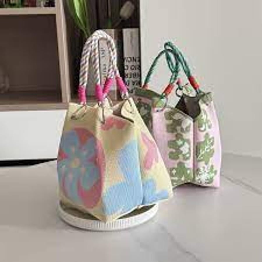 Women's fabric handbag woven with various designs