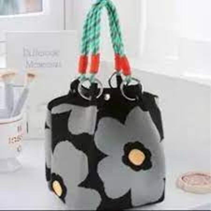 Women's fabric handbag woven with various designs