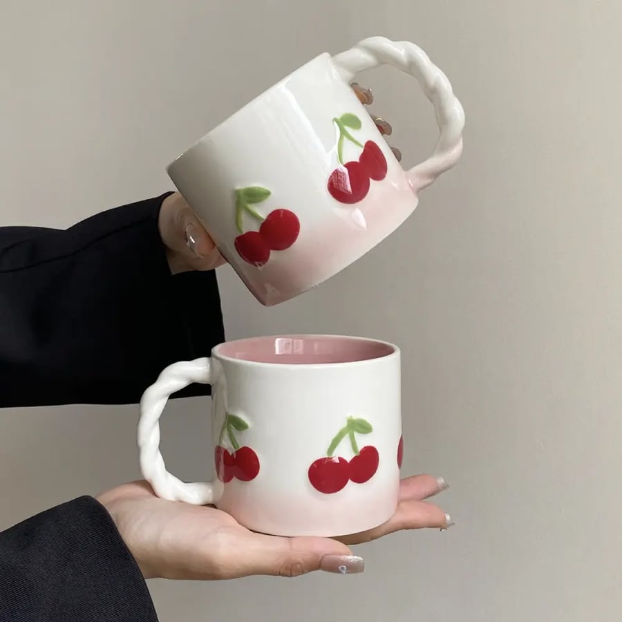 كوب سيراميك وردي 370ML بمقبض ملتوي