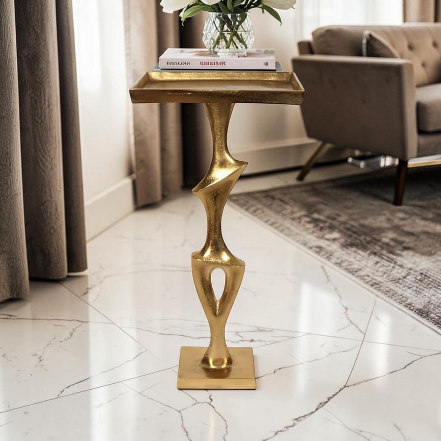 Art Form gold side table with luxurious modern design