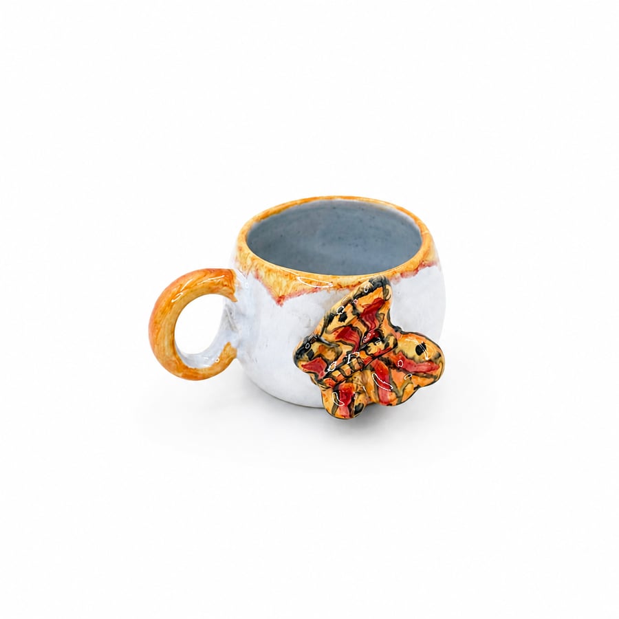 Butterfly clay cup