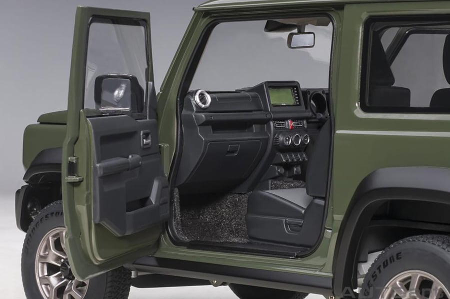 Model: Suzuki Jimny Sierra (JB74) Brand: Autoart  Scale: 1/18 Color: Jungle Green  SKU: 785‪09