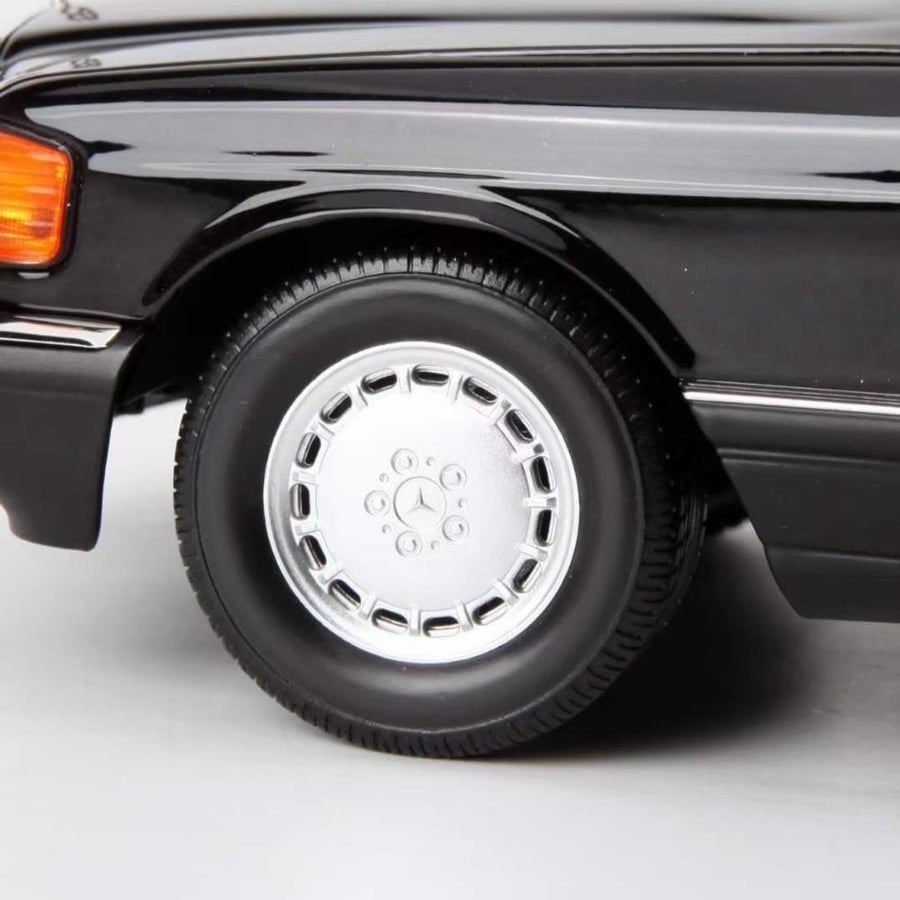 1989 Mercedes-Benz 560 SEL  Brand: Norev  Scale: 1/18 Color: Black with Red Interior SKU : 183789