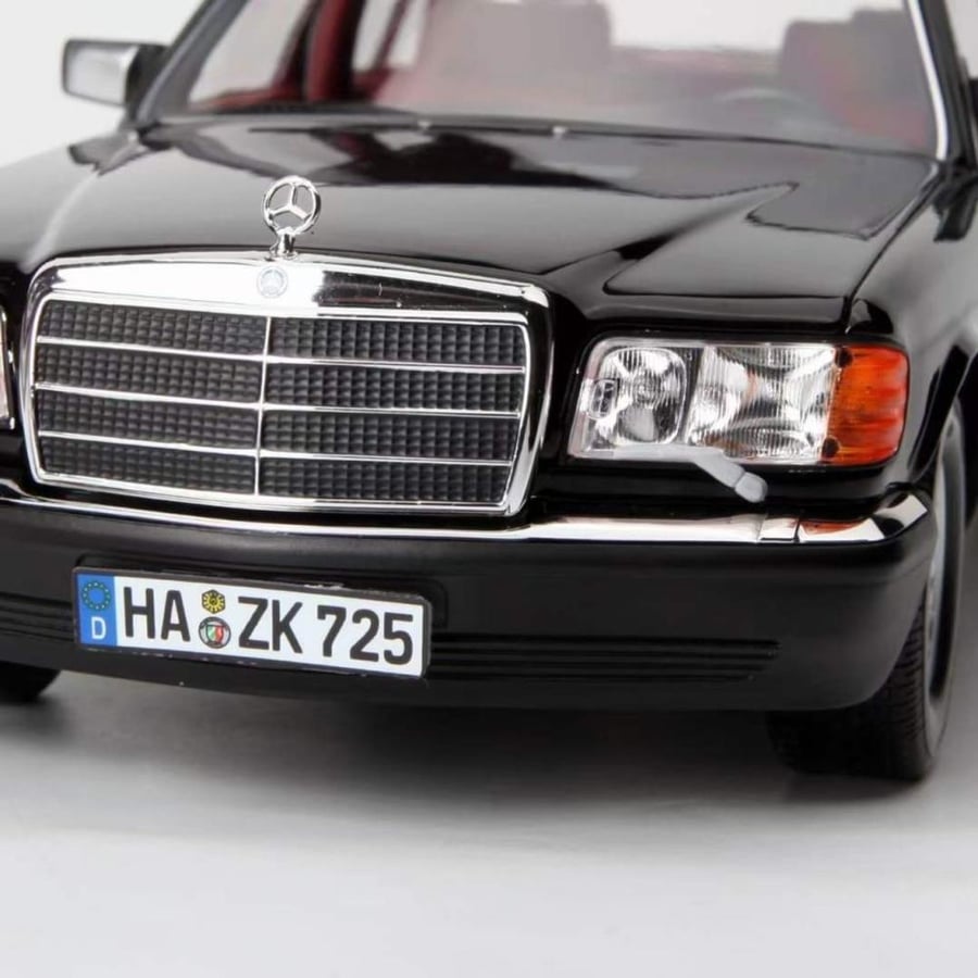 1989 Mercedes-Benz 560 SEL  Brand: Norev  Scale: 1/18 Color: Black with Red Interior SKU : 183789