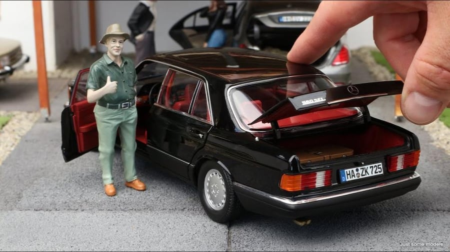 1989 Mercedes-Benz 560 SEL  Brand: Norev  Scale: 1/18 Color: Black with Red Interior SKU : 183789