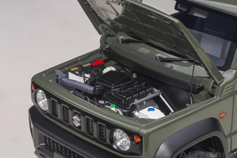 Model: Suzuki Jimny Sierra (JB74) Brand: Autoart  Scale: 1/18 Color: Jungle Green  SKU: 785‪09