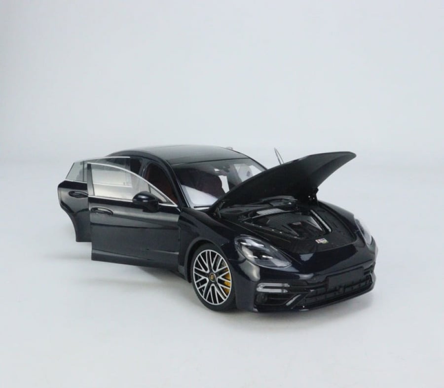 Porsche Panamera Turbo S 2020 Brand: Minichamps  Scale: 1/18 Color: Gentian Blue Limited Edition : 1 of 504 Units SKU : 113061075