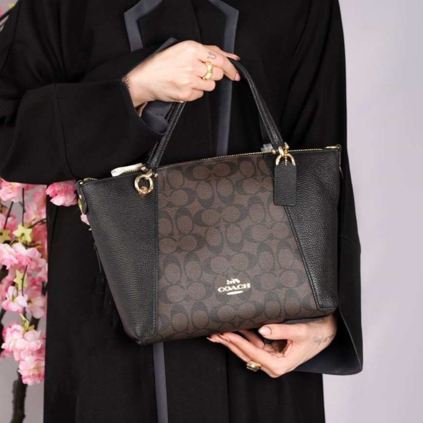 شنطة coach