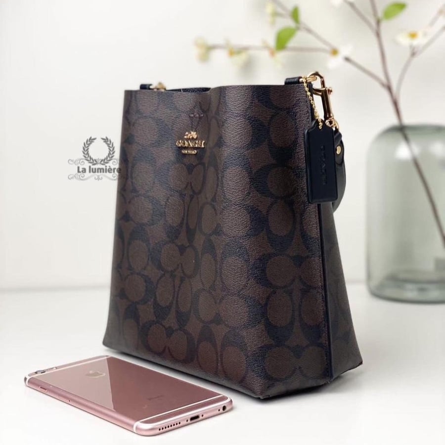 شنطة coach