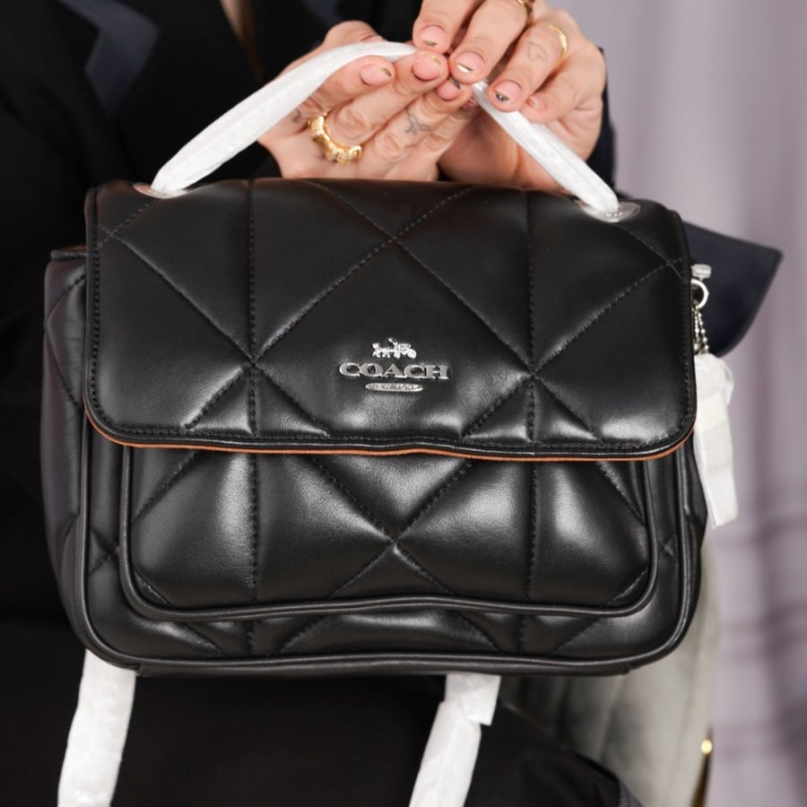 شنطة coach