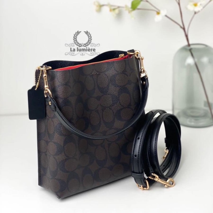 شنطة coach