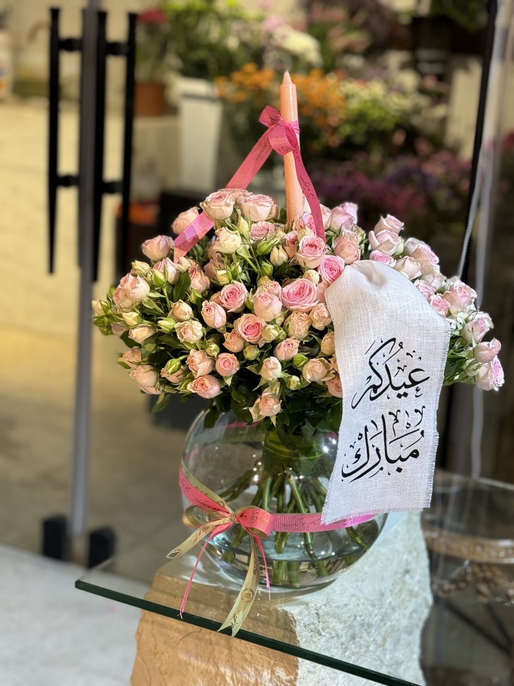 فازة عيد مع شريطه وشمع