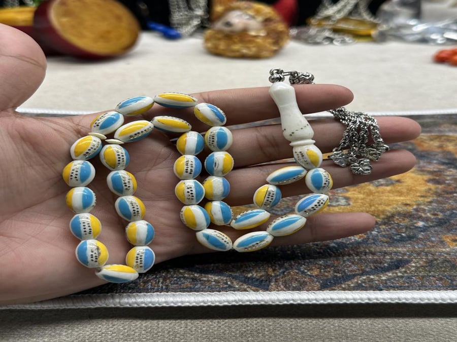 مسباح نصراوي ( عضم مطعم فيروز وناحس وعقيق اصفر ٣٣ خرزه ٨ مل