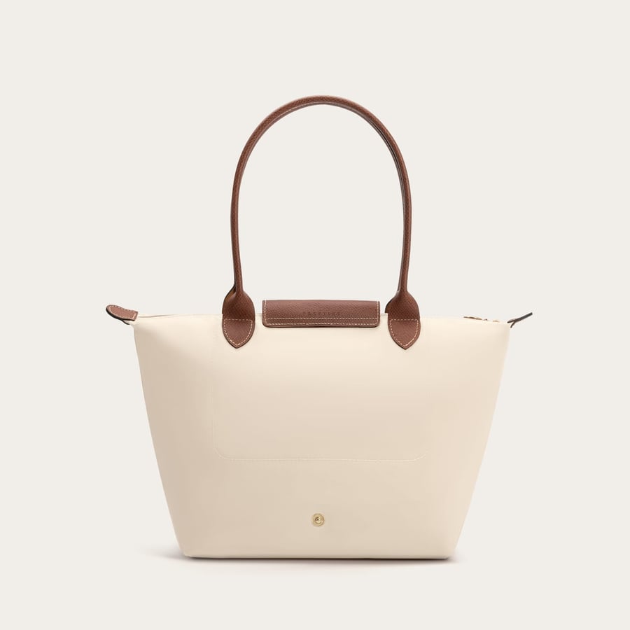 A women's bag medium size in beige and brown color