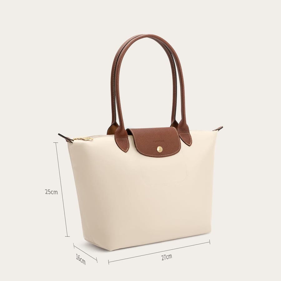 A women's bag medium size in beige and brown color