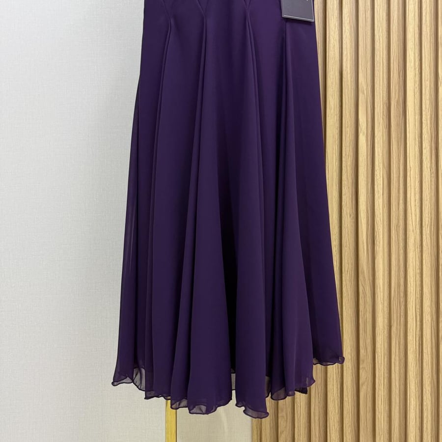 Mira's purple dress