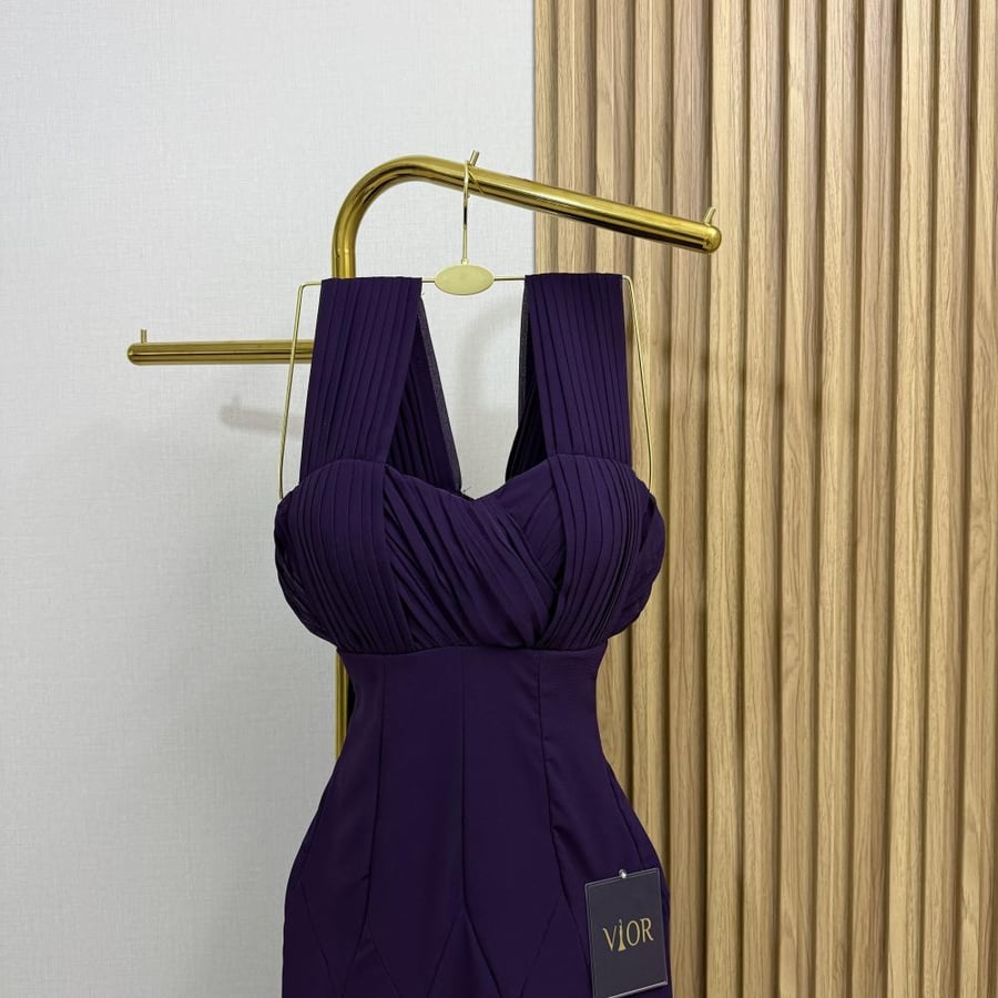Mira's purple dress