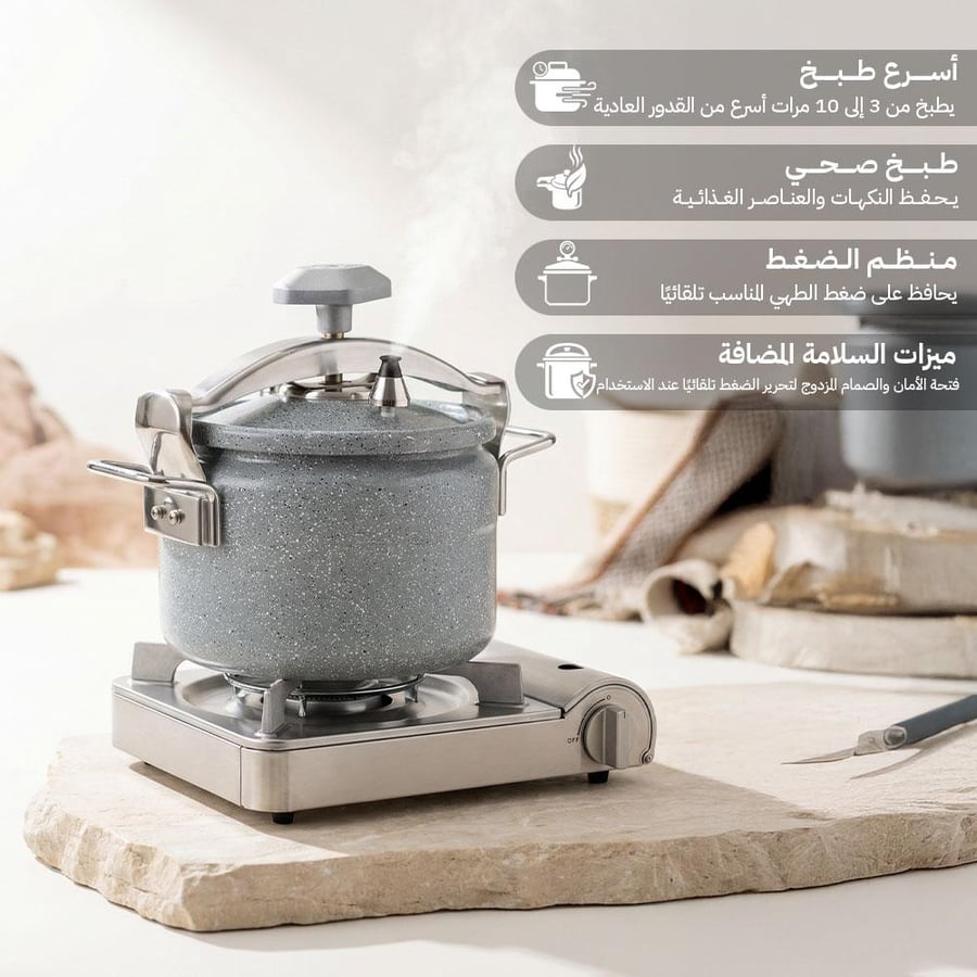 قدر ضغط السنيدي 10 لتر على موقد حجري مع إبراز شعار سلامة الطهي والطبخ