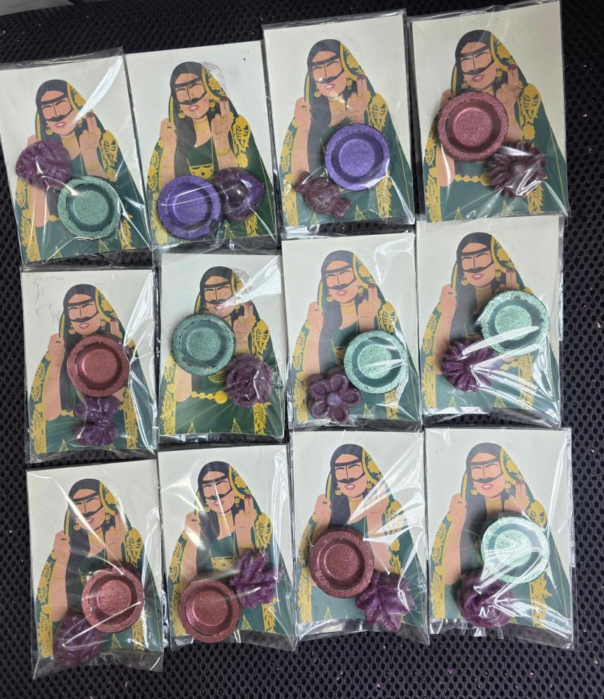 Henna distributions come with a card, charcoal, and incense