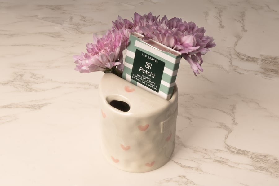 Coffee cup with Patchi chocolate and violet cherry blossom