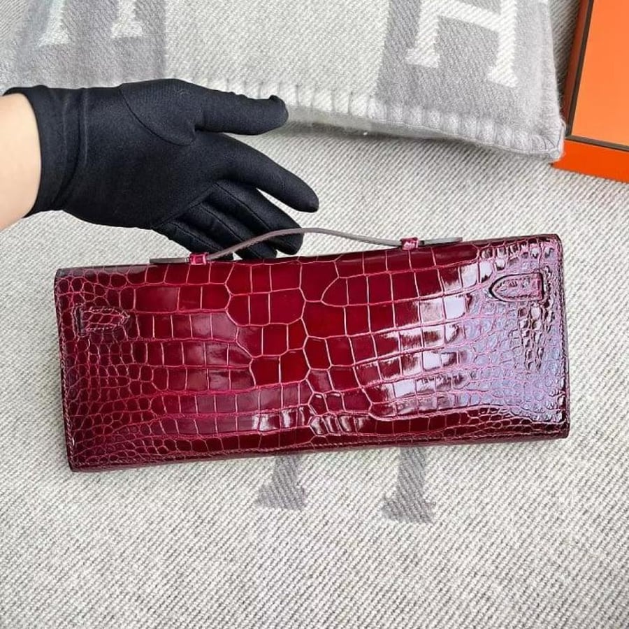 Kelly cut Shiny Porosus Bordeaux Red GHW